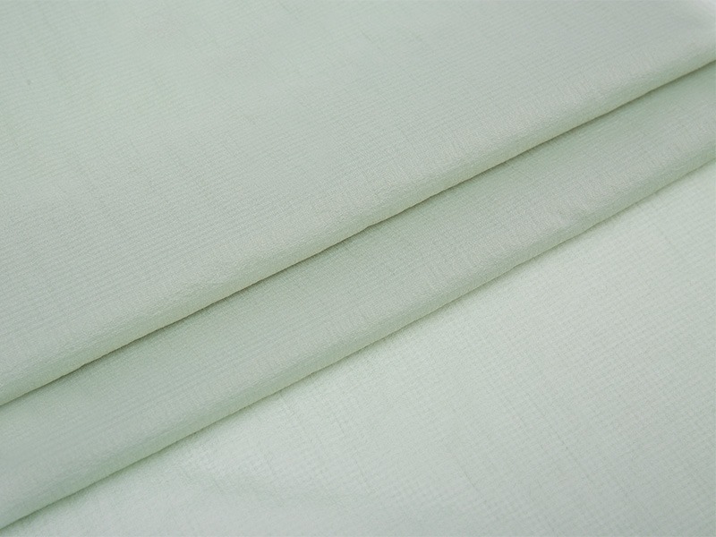 Polyester interlinat, nefes alabilirlik yoluyla kıyafetlerin konforunu nasıl geliştirir?
